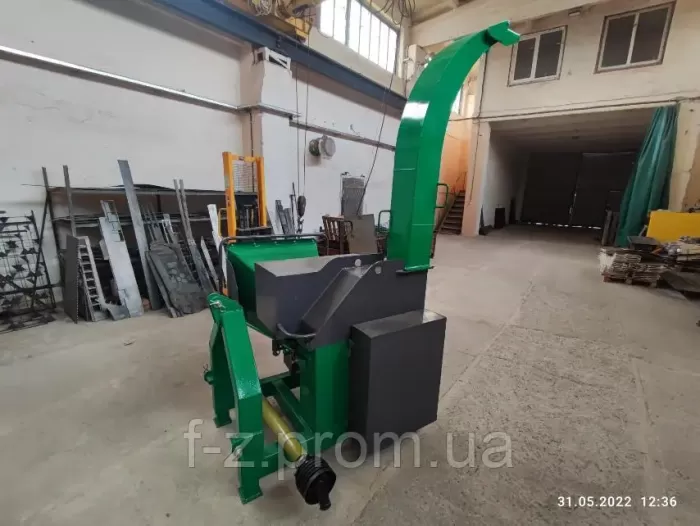 Logging machine RM180T. Tractor-mounted chipper. Chip crusher for the tractor