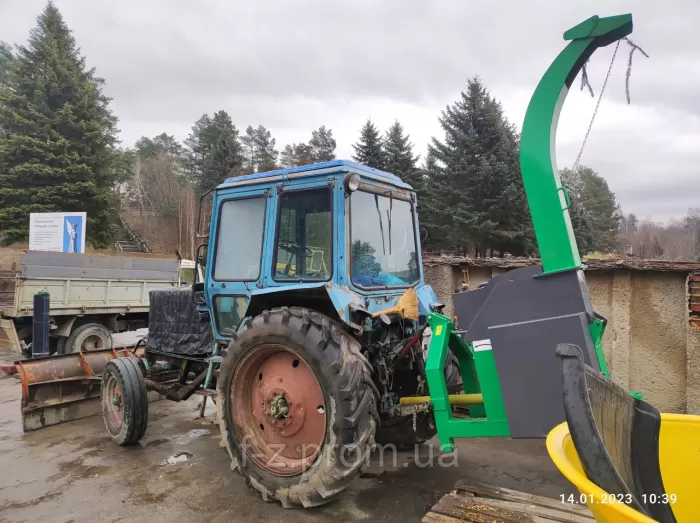 Сhopper RM180T Lateral with hydraulic feed. A tractor corner wood chipper with the possibility of attaching a trailer